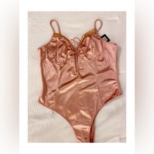 Wild Cat bodysuit, Size L fits more as small NWT